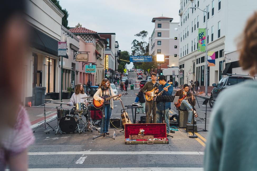 A band playing in SLO at the Thursday Night Farmer's Market by photographer Kirsten Alana
